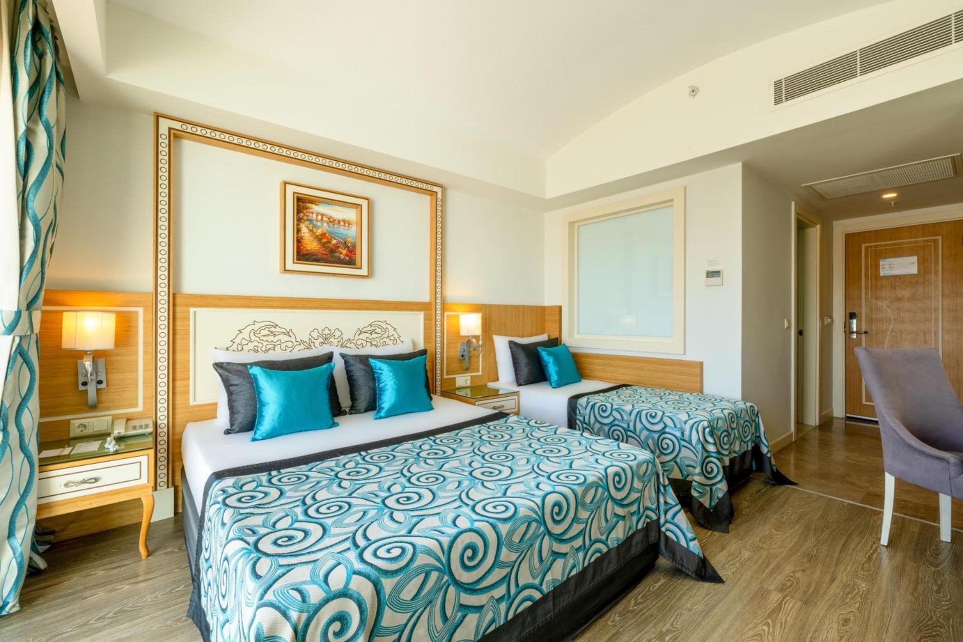 Standard Triple Room Side Sea View